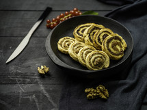 Swirl cookie treats with pecans on black