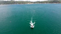 Cinematic Shot Flying Towards a Boat on Lake Arrowhead