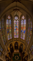 majestic church windows filled with colorful stained glass Montpellier