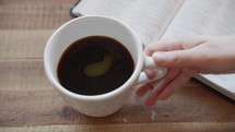 coffee and an opened Bible 