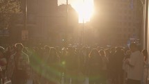 Slow Motion Crowd of People Walking on Calle Gran Vía Street during Sunset Madrid, Spain