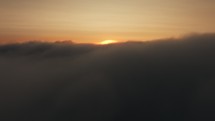 Majestic sunset above the clouds