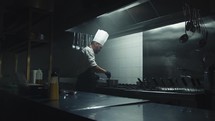 Chef preparing dishes late at night 