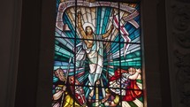 Porto, Portugal - The stained glass depicting Jesus inside the Church of Saint Ildefonso in Porto.