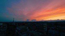 Stunning red sunrise over the city silhouettes