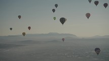 Hot Air Balloon Flying Above Pyramids of San Juan Teotihuacan Mexico Sunrise Ride