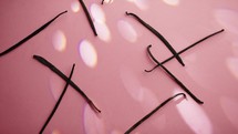 Vanilla Pods On Pink Background