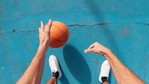 Basketball tricks freestyle in a outdoor court 