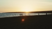 Romantic Walk on the beach At Sunset