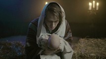Joseph holding baby Jesus 