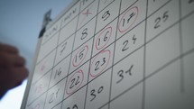 Marking Dates On A Calendar board 