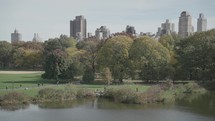 Manhattan, New York City, USA - October Central Park Fall Foliage - People Walking, Biking and Jogging in the Morning