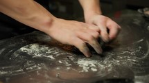 Chef Making The Italian Black Ink Cuttlefish Dough At Restaurant