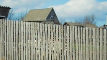 A look at an old wooden fence in the countryside.