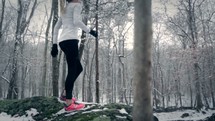 a woman exercising in the snow 