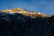 Sunset on snowy mountain in Yosemite