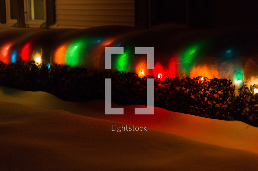 Christmas lights in snow 