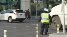 NYPD officer directing traffic 