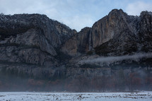 Snowy mountain in Yosemite with trees
