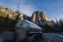 Truck on the road in front of a mountain in Yosemite