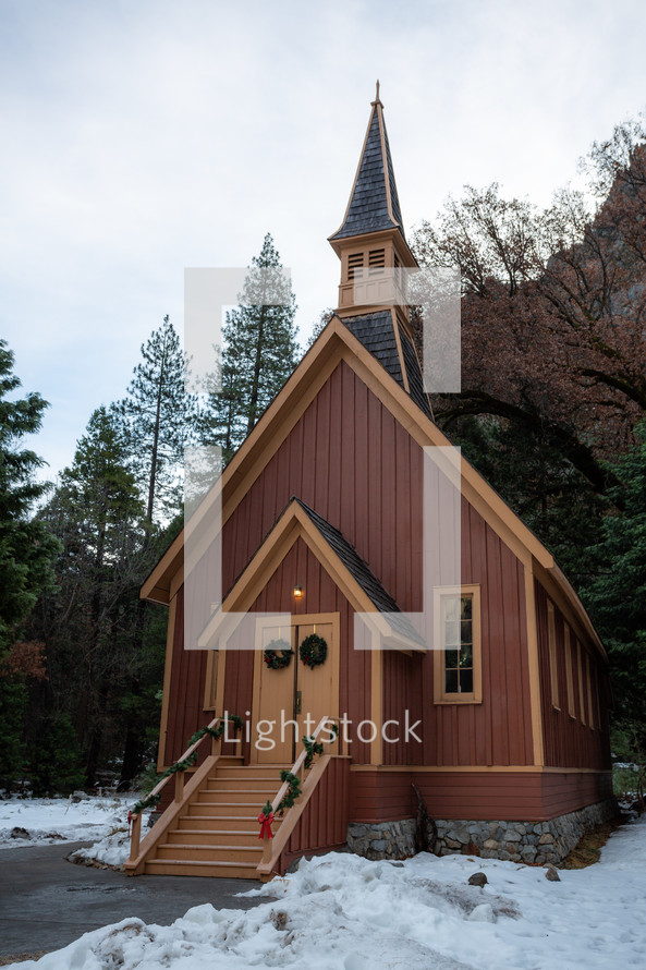 Small church at Christmas in the snow