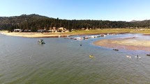 Drone Shot Descending on Kayakers on Big Bear Lake