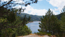 Mountain lake seen through the trees