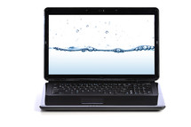 laptop with image of water on the screen 