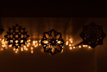 paper snowflakes on a window 