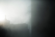 city in dense fog 