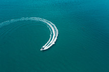 Motor boat with wake in the ocean