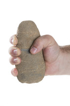 hand grasping a stone 