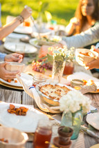 family thanksgiving dinner outdoors 