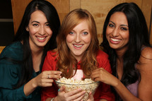 friends eating popcorn 