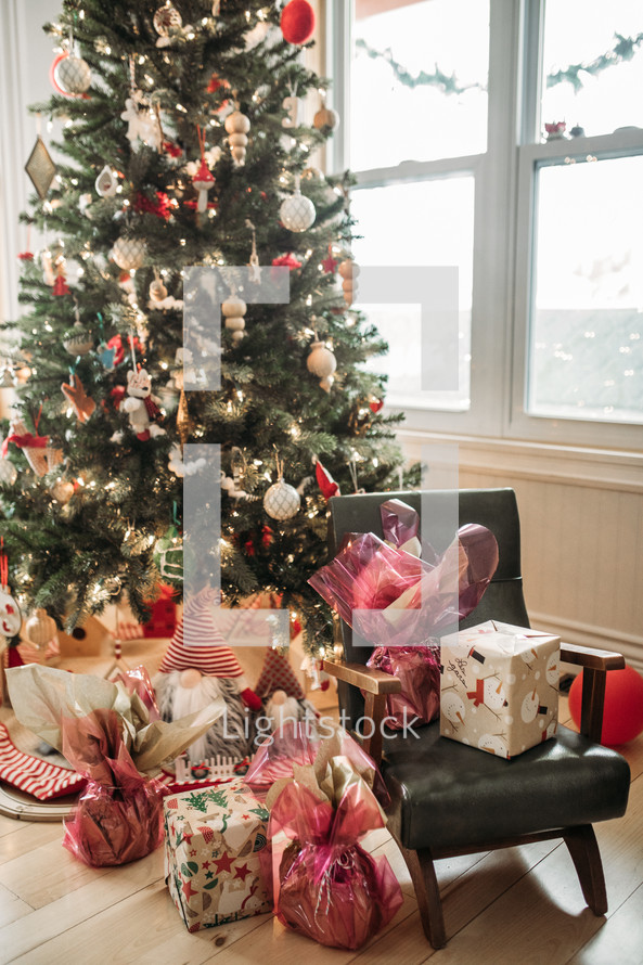 gifts around a Christmas tree 