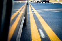 yellow stripes on a road 