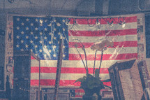 large American flag hanging in a studio
