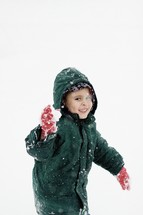 boy throwing a snow ball