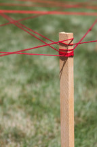 string on a stake 