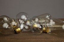 a group of lightbulbs on a table