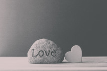 a rock with the word love