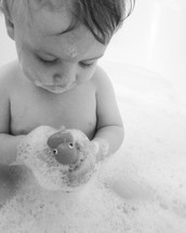 toddler boy in the bathtub 