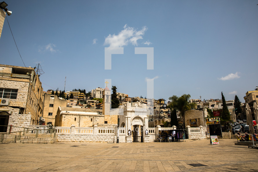 courtyard in front of a church in the holy land 