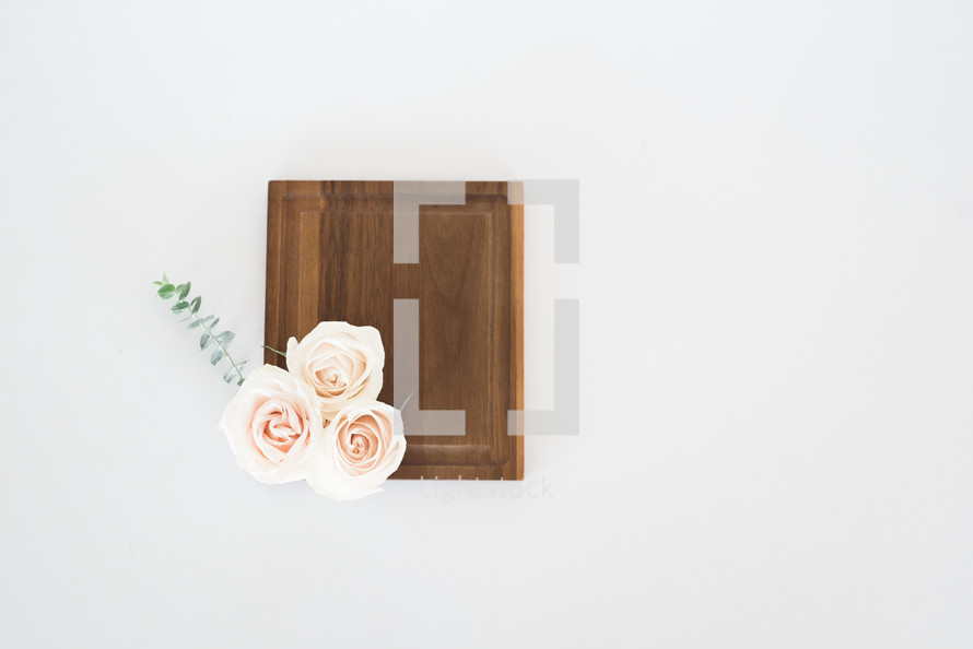 roses on a wood tray 