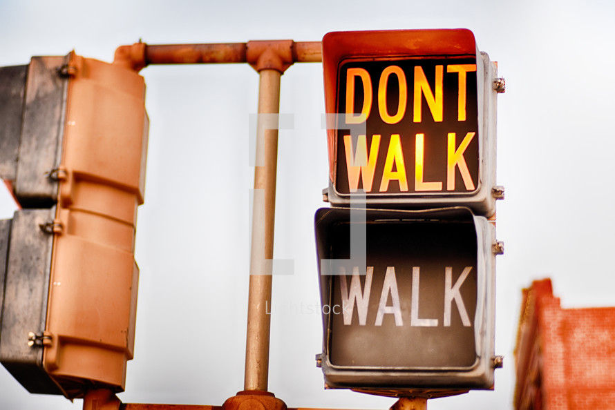 don't walk, walk, street sign at a crosswalk 