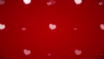 White hearts appears on red background