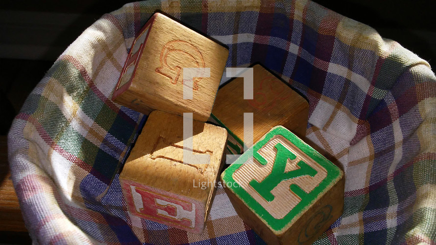 A group of Alphabet blocks for home schooling, education and learning for young children in a school, home or primary school environment.  Creative Visuals for helping children learn their alphabet, spelling, grammar and learning how to read and write. 