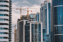 Crane and skyscraper constructions in the city