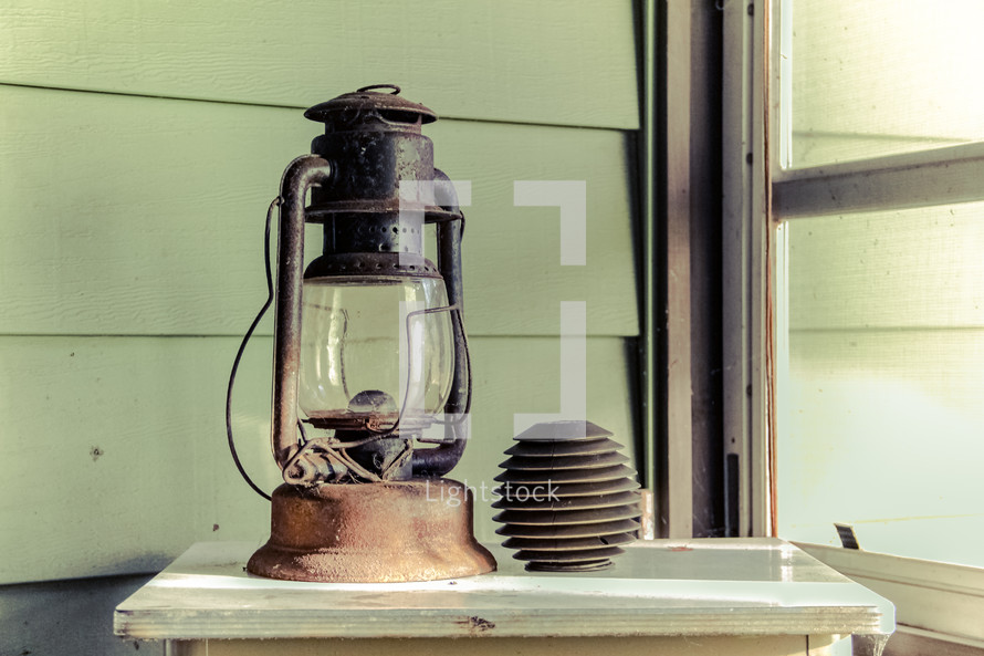 old lantern in a window 