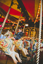 kid on a merry-go-round 